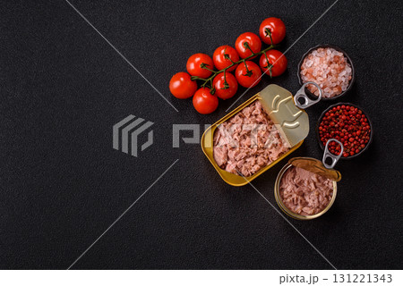 Tuna, canned fish in a can and on a plate for making sandwiches and other food. Canned tuna Tuna, canned fish in a can and on a plate for making sandwiches and other food. Canned tuna 131221343