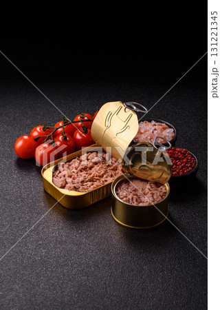 Tuna, canned fish in a can and on a plate for making sandwiches and other food. Canned tuna 131221345