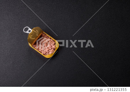 Tuna, canned fish in a can and on a plate for making sandwiches and other food. Canned tuna Tuna, canned fish in a can and on a plate for making sandwiches and other food. Canned tuna 131221355