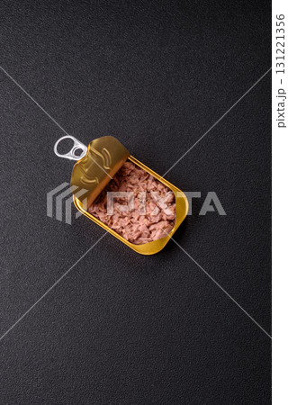 Tuna, canned fish in a can and on a plate for making sandwiches and other food. Canned tuna Tuna, canned fish in a can and on a plate for making sandwiches and other food. Canned tuna 131221356