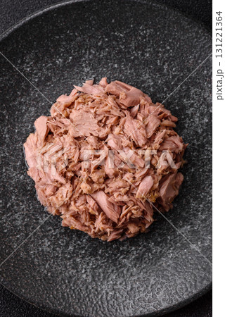 Tuna, canned fish in a can and on a plate for making sandwiches and other food. Canned tuna 131221364