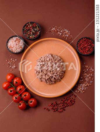 Tuna, canned fish in a can and on a plate for making sandwiches and other food. Canned tuna Tuna, canned fish in a can and on a plate for making sandwiches and other food. Canned tuna 131221388
