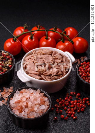 Tuna, canned fish in a can and on a plate for making sandwiches and other food. Canned tuna 131221401