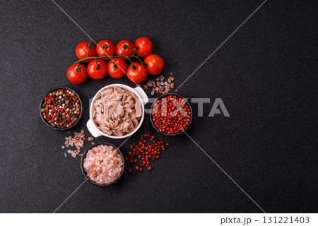 Tuna, canned fish in a can and on a plate for making sandwiches and other food. Canned tuna Tuna, canned fish in a can and on a plate for making sandwiches and other food. Canned tuna 131221403
