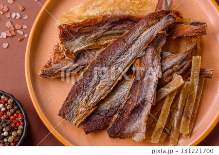 Dried salted fish as snacks or jerky, seafood as slices. Dried seafood snacks Dried salted fish as snacks or jerky, seafood as slices. Dried seafood snacks 131221700