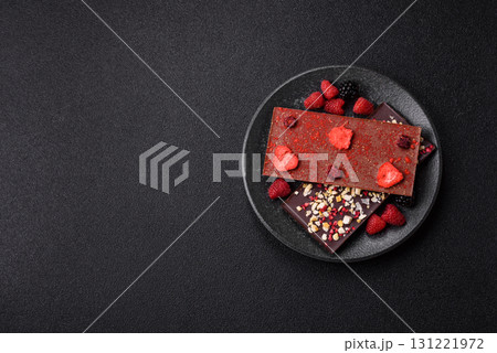 Bar sweet craft artisan chocolate with dried fruits made at home. Craft chocolate Bar sweet craft artisan chocolate with dried fruits made at home. Craft chocolate 131221972