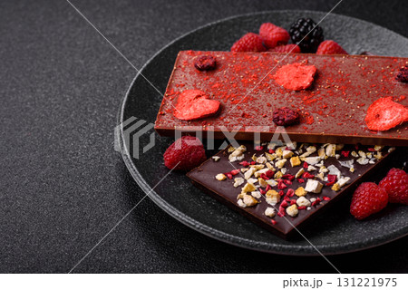 Bar sweet craft artisan chocolate with dried fruits made at home. Craft chocolate 131221975
