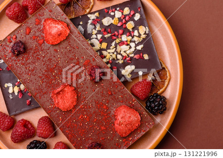 Bar sweet craft artisan chocolate with dried fruits made at home. Craft chocolate Bar sweet craft artisan chocolate with dried fruits made at home. Craft chocolate 131221996