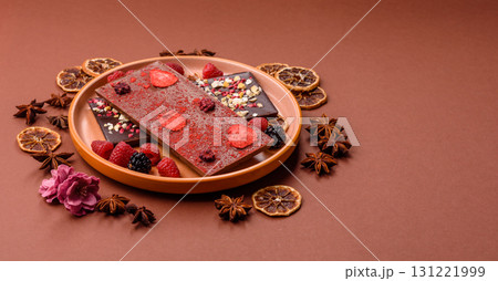 Bar sweet craft artisan chocolate with dried fruits made at home. Craft chocolate Bar sweet craft artisan chocolate with dried fruits made at home. Craft chocolate 131221999