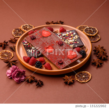 Bar sweet craft artisan chocolate with dried fruits made at home. Craft chocolate 131222002