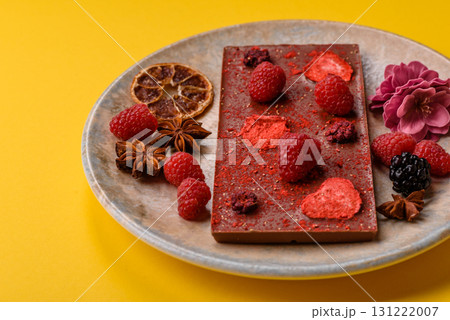 Bar sweet craft artisan chocolate with dried fruits made at home. Craft chocolate Bar sweet craft artisan chocolate with dried fruits made at home. Craft chocolate 131222007