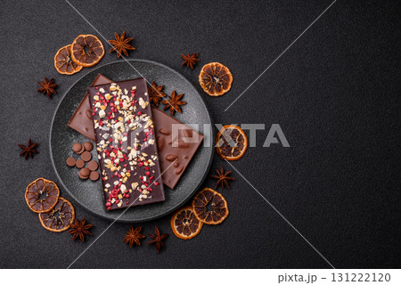 Bar sweet craft artisan chocolate with dried fruits made at home. Craft chocolate Bar sweet craft artisan chocolate with dried fruits made at home. Craft chocolate 131222120