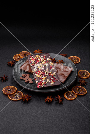 Bar sweet craft artisan chocolate with dried fruits made at home. Craft chocolate 131222122