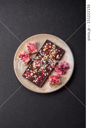 Bar sweet craft artisan chocolate with dried fruits made at home. Craft chocolate Bar sweet craft artisan chocolate with dried fruits made at home. Craft chocolate 131222156