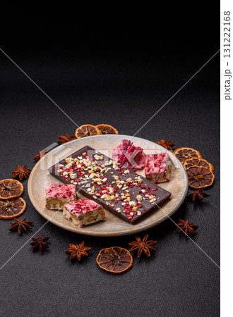 Bar sweet craft artisan chocolate with dried fruits made at home. Craft chocolate 131222168