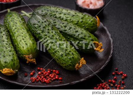 Fresh raw whole cucumbers, an ingredient for preparing salads and vegetarian dishes. Green fresh cucumbers 131222200