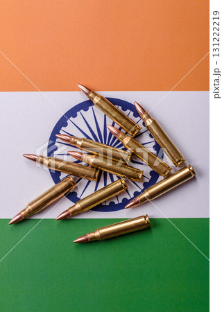 Money and flag of India with ammunition and tank as a concept of weapons for war. India and weapons 131222219