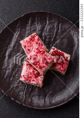 Nougat or white caramel with hazelnuts and strawberry pieces. White nougat 131222343