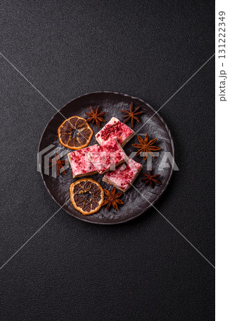 Nougat or white caramel with hazelnuts and strawberry pieces. White nougat Nougat or white caramel with hazelnuts and strawberry pieces. White nougat 131222349