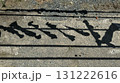 Abstract decorative fence shadow pattern on concrete ground 131222616