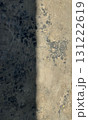 Grunge concrete wall texture with dark and light contrast 131222619