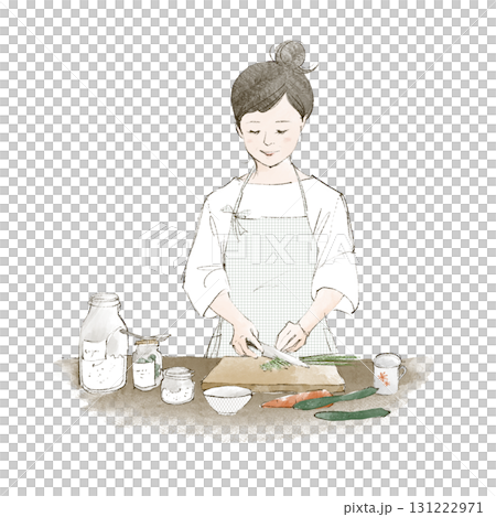 A woman standing in the kitchen A woman standing in the kitchen 131222971