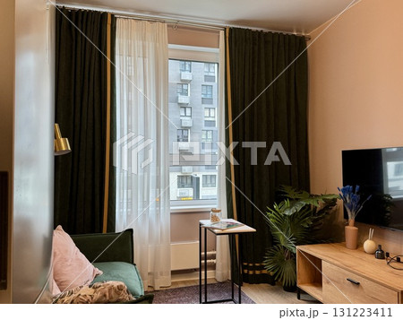 modern living room in a stylish interior of a new apartment with designer renovation 131223411