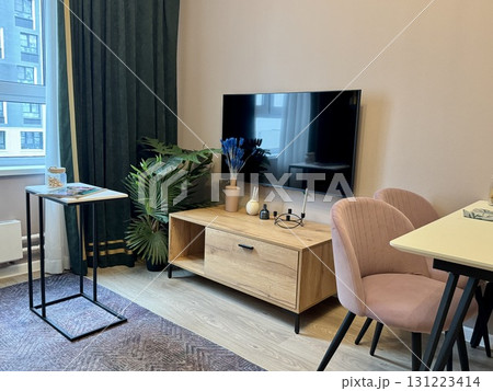 modern living room in a stylish interior of a new apartment with designer renovation 131223414