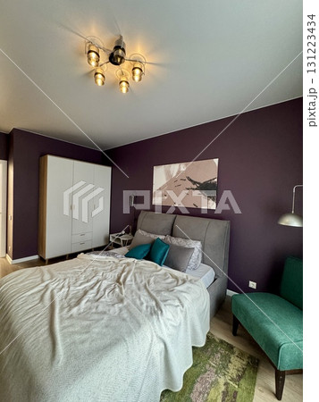a modern bedroom in a stylish interior of a new apartment with designer renovation a modern bedroom in a stylish interior of a new apartment with designer renovation 131223434
