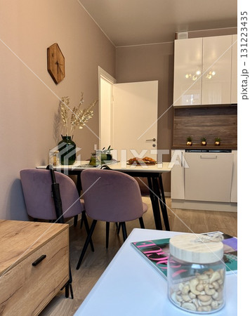 new stylish kitchen set in a modern apartment interior 131223435