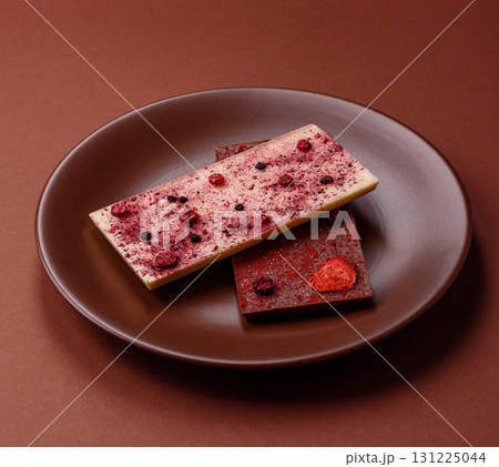 Bar sweet craft artisan chocolate with dried fruits made at home. Craft chocolate 131225044