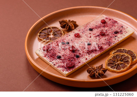 Bar sweet craft artisan chocolate with dried fruits made at home. Craft chocolate 131225060