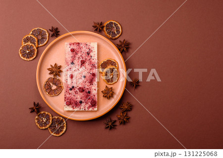 Bar sweet craft artisan chocolate with dried fruits made at home. Craft chocolate 131225068