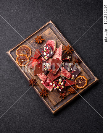 Bar sweet craft artisan chocolate with dried fruits made at home. Craft chocolate 131225114