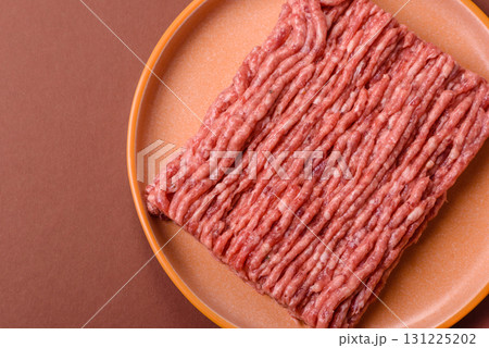 Raw ground beef meat food, ingredient for making cutlets or meatballs. Raw ground beef 131225202