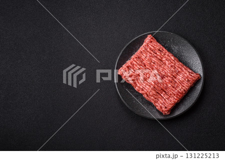 Raw ground beef meat food, ingredient for making cutlets or meatballs. Raw ground beef 131225213