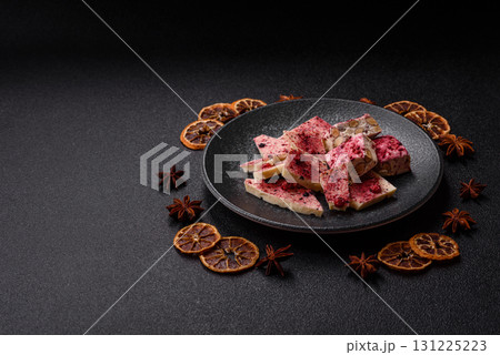 Bar sweet craft artisan chocolate with dried fruits made at home. Craft chocolate 131225223