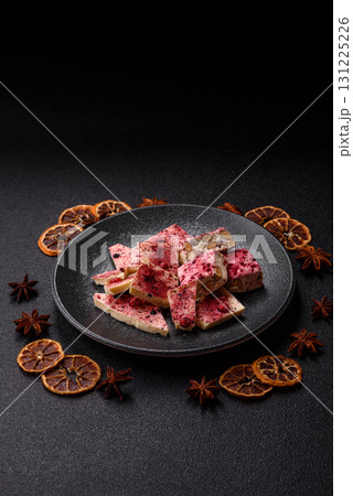 Bar sweet craft artisan chocolate with dried fruits made at home. Craft chocolate 131225226