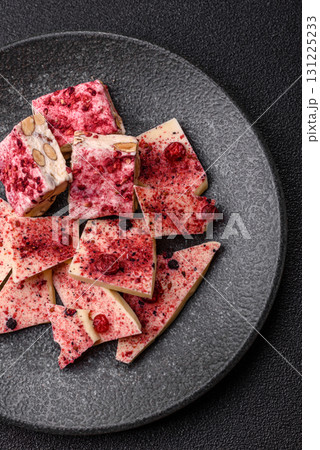 Bar sweet craft artisan chocolate with dried fruits made at home. Craft chocolate 131225233