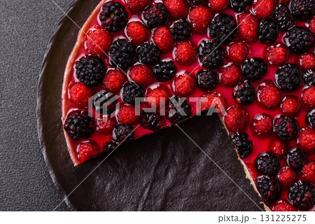 Pie, cheesecake with raspberries and blackberries, mascarpone cheese. Piece of cheesecake Pie, cheesecake with raspberries and blackberries, mascarpone cheese. Piece of cheesecake 131225275
