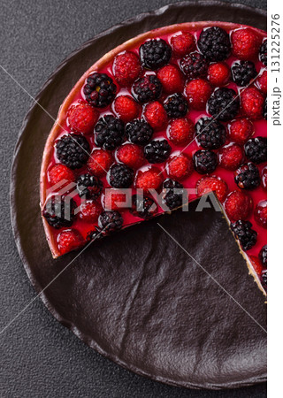 Pie, cheesecake with raspberries and blackberries, mascarpone cheese. Piece of cheesecake Pie, cheesecake with raspberries and blackberries, mascarpone cheese. Piece of cheesecake 131225276