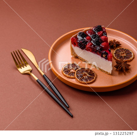 Pie, cheesecake with raspberries and blackberries, mascarpone cheese. Piece of cheesecake Pie, cheesecake with raspberries and blackberries, mascarpone cheese. Piece of cheesecake 131225297