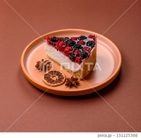 Pie, cheesecake with raspberries and blackberries, mascarpone cheese. Piece of cheesecake Pie, cheesecake with raspberries and blackberries, mascarpone cheese. Piece of cheesecake 131225308