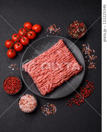 Raw ground beef meat food, ingredient for making cutlets or meatballs. Raw ground beef 131225346