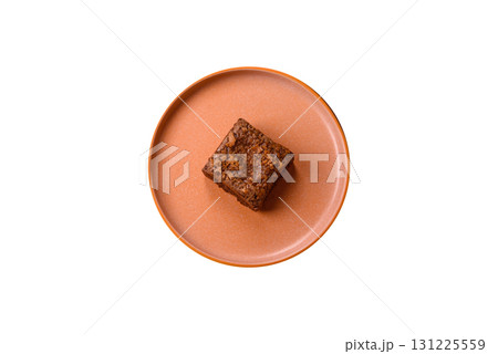 Chocolate brownie cake, food, sweet dessert with nuts rectangular shape. Sweet chocolate brownie Chocolate brownie cake, food, sweet dessert with nuts rectangular shape. Sweet chocolate brownie 131225559