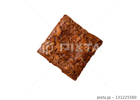 Chocolate brownie cake, food, sweet dessert with nuts rectangular shape. Sweet chocolate brownie Chocolate brownie cake, food, sweet dessert with nuts rectangular shape. Sweet chocolate brownie 131225560