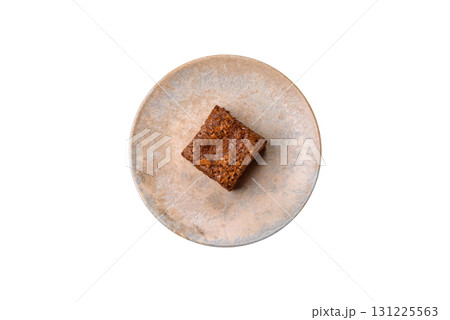 Chocolate brownie cake, food, sweet dessert with nuts rectangular shape. Sweet chocolate brownie Chocolate brownie cake, food, sweet dessert with nuts rectangular shape. Sweet chocolate brownie 131225563