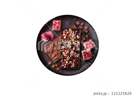 Bar sweet craft artisan chocolate with dried fruits made at home. Craft chocolate Bar sweet craft artisan chocolate with dried fruits made at home. Craft chocolate 131225626