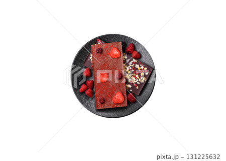 Bar sweet craft artisan chocolate with dried fruits made at home. Craft chocolate 131225632