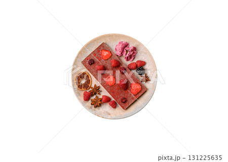 Bar sweet craft artisan chocolate with dried fruits made at home. Craft chocolate 131225635